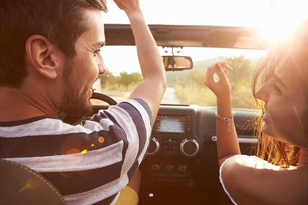 Young Couple Having Fun on a Road Trip