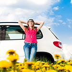 Woman in front of SUV